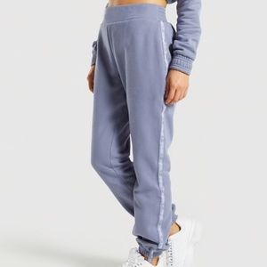 steel blue gymshark joggers w logo on legs!